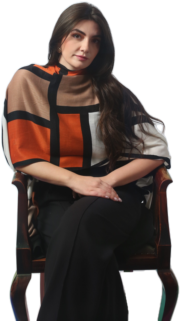 Iva Kojic seated in an armchair